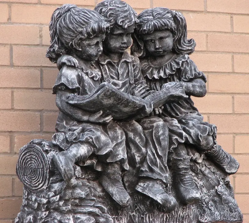 Statue that sits in the library garden